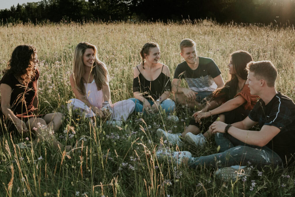 3 couples in field tall