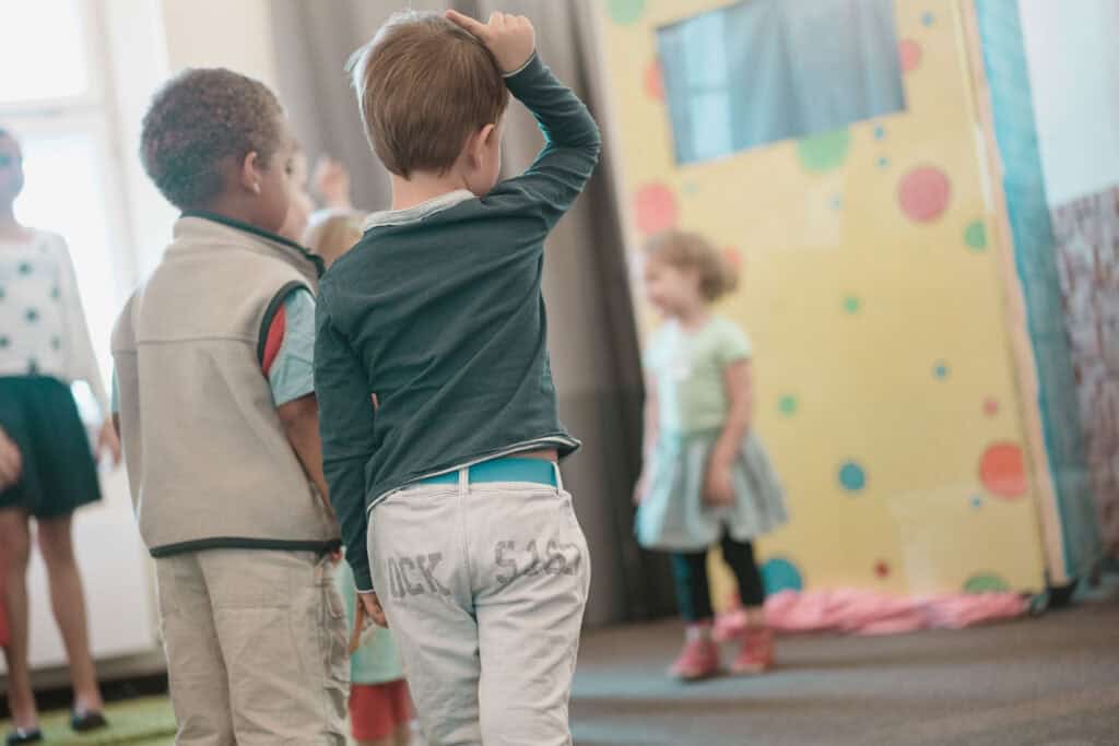 Children in the children's service in Munich, playing and learning together in a colorful, child-friendly church.