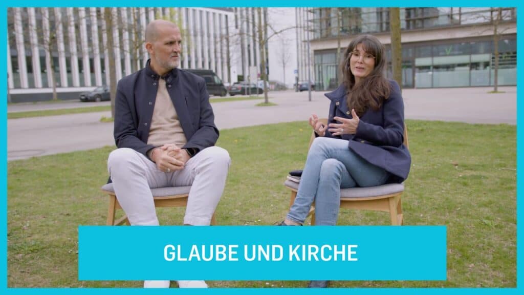 Two people talking about faith and church, outside modern church, inspiring discussion, Christian commitment, community spirit at ICF Munich.